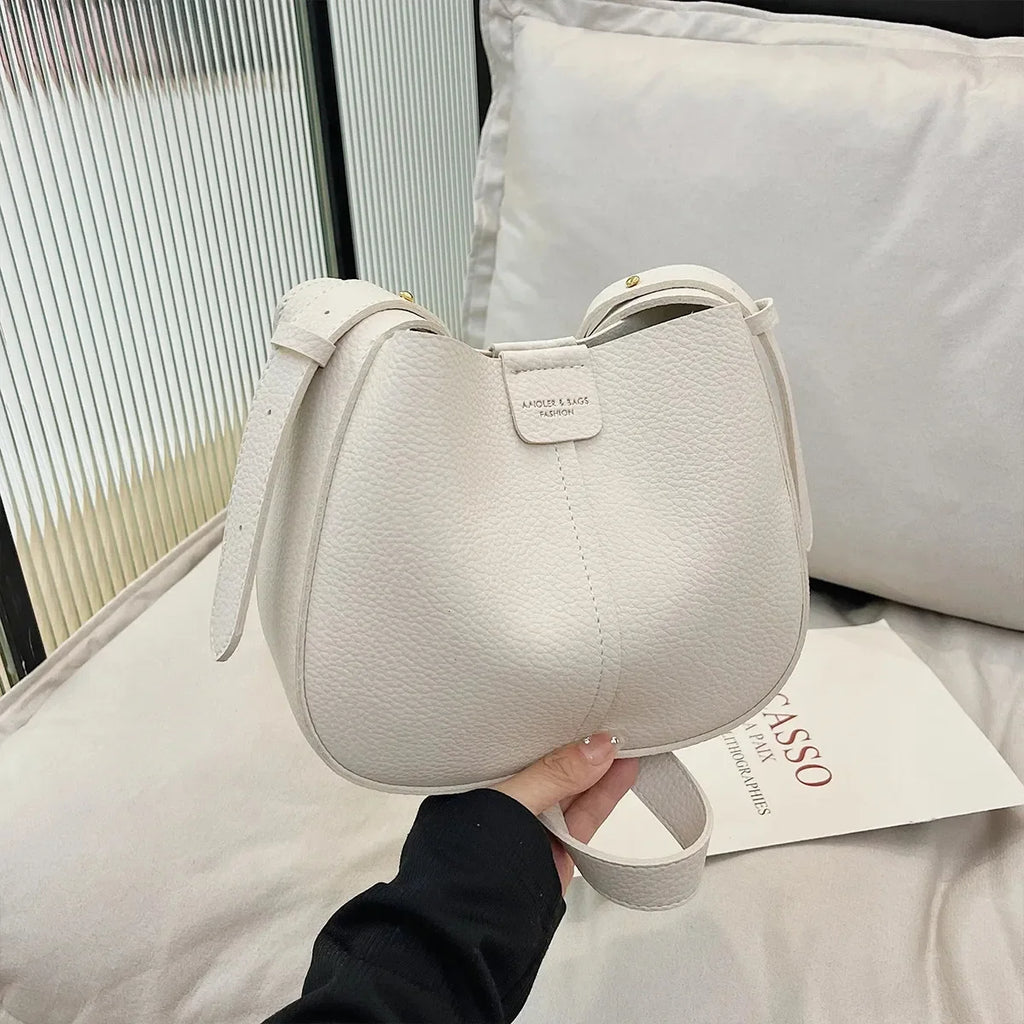 Womens minimalist shoulder bag large capacity PU leather magnetic cross body used for daily commutingshopping 250320