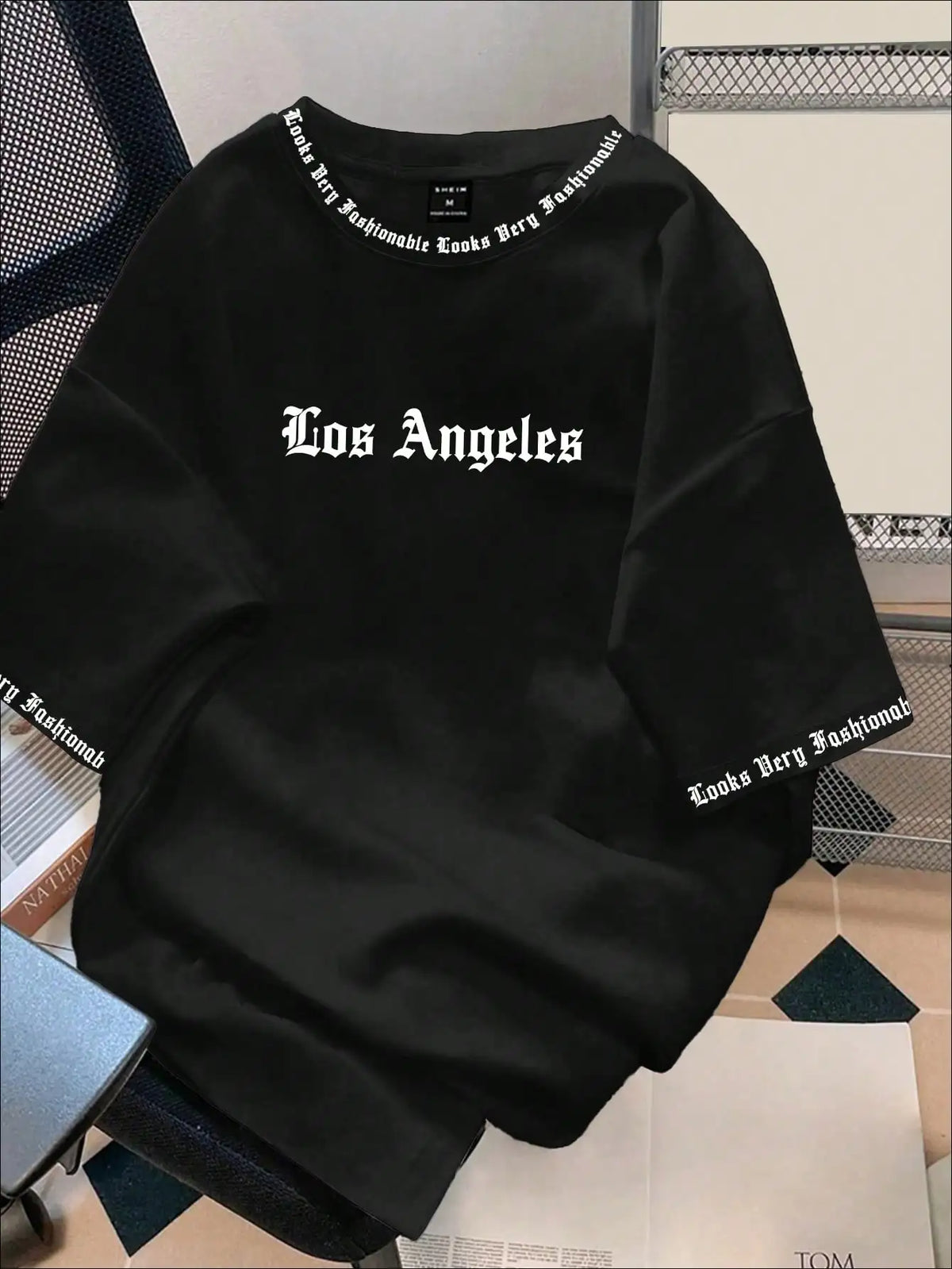 Black Oversized Graphic Print Crew Neck T-Shirt with Gothic Font Design