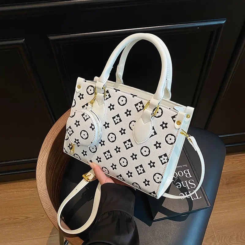 Free shipping designer women's new fashionable printed shoulder bag trendy armpit tote outdoor hand-held diagonal cross bag