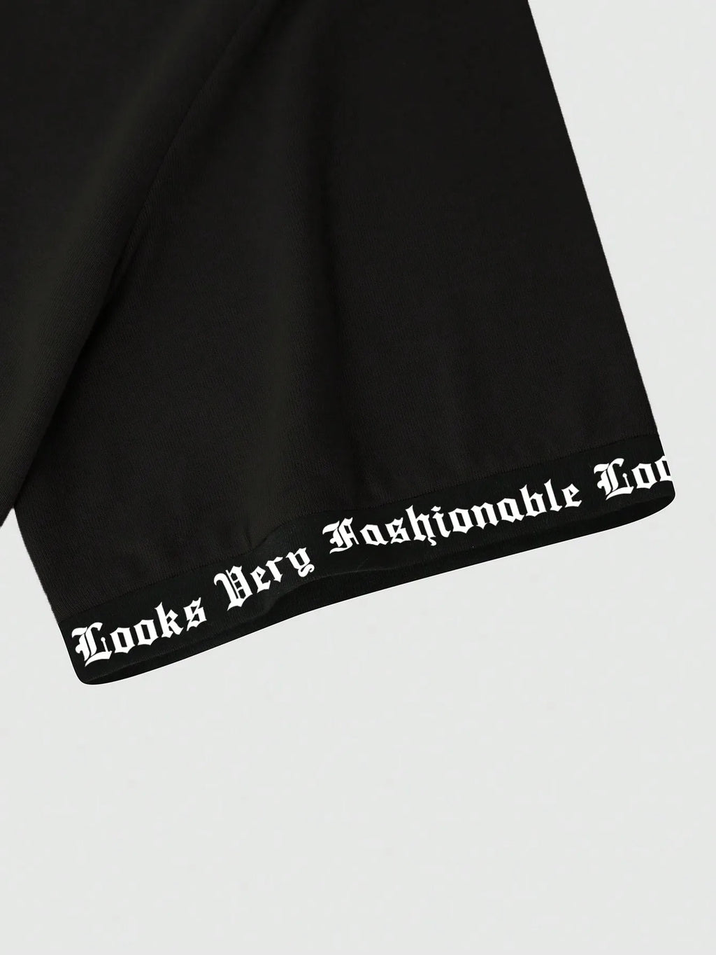 Black Oversized Graphic Print Crew Neck T-Shirt with Gothic Font Design