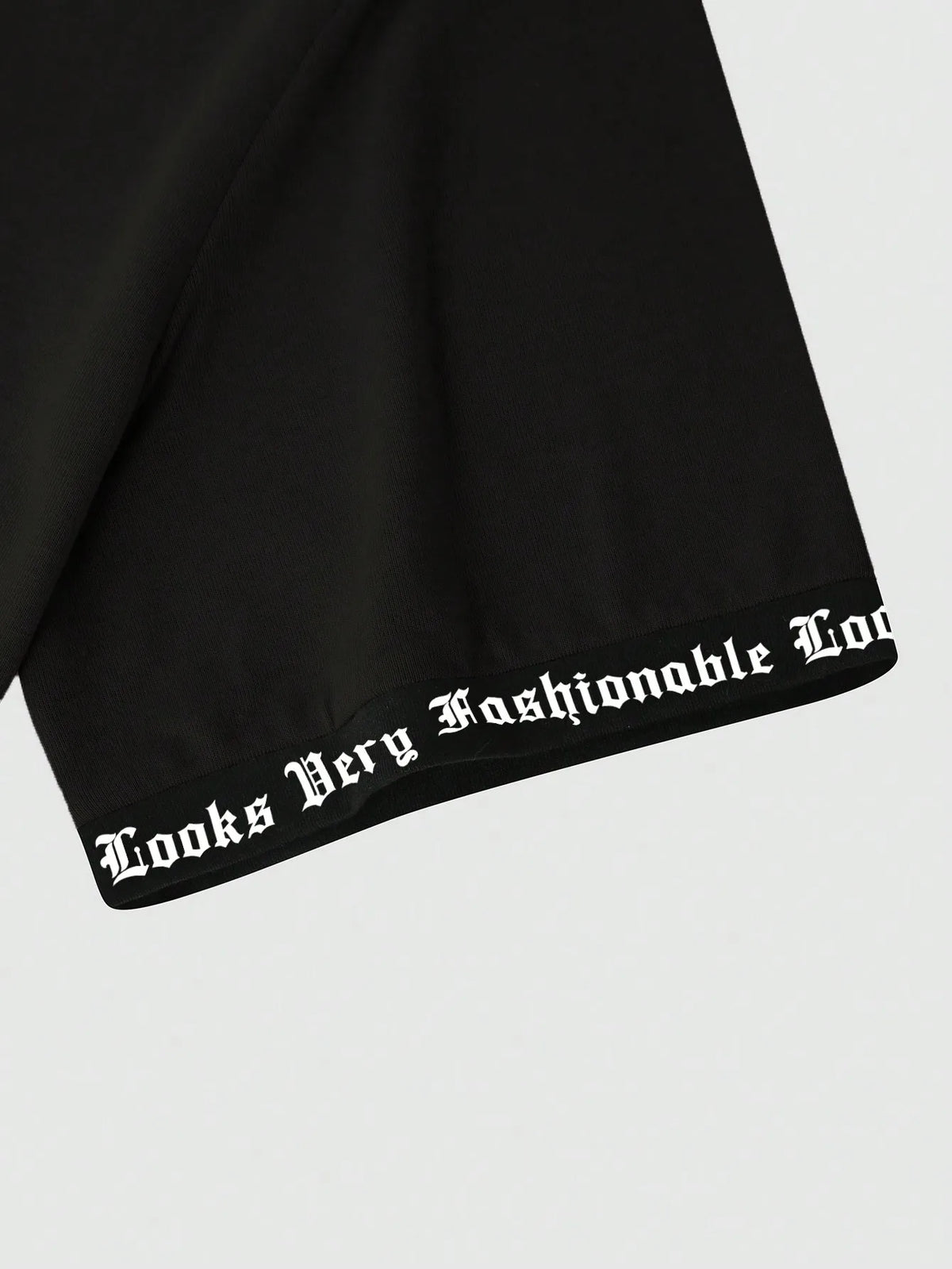 Black Oversized Graphic Print Crew Neck T-Shirt with Gothic Font Design