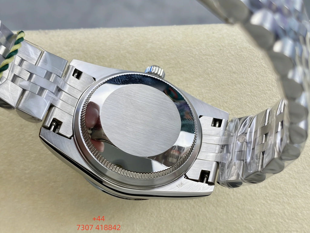 Customized luxury women's watch, featuring a 31mm dial, stainless steel strap, and fully automatic mechanical movement