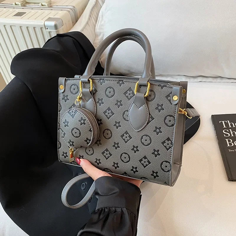 Free shipping designer women's new fashionable printed shoulder bag trendy armpit tote outdoor hand-held diagonal cross bag