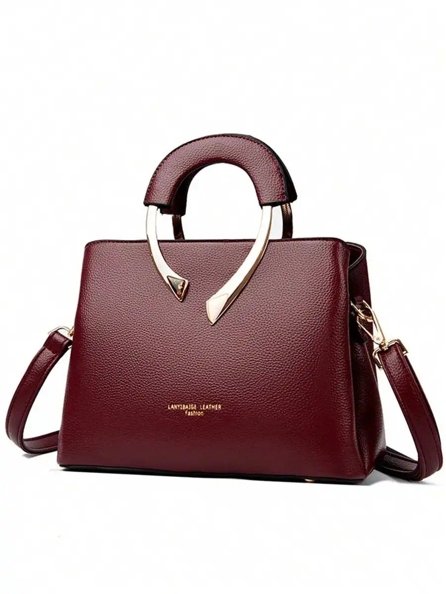 Burgundy Top-Handle Handbag with Metal Arch Handle and Textured Faux Leather