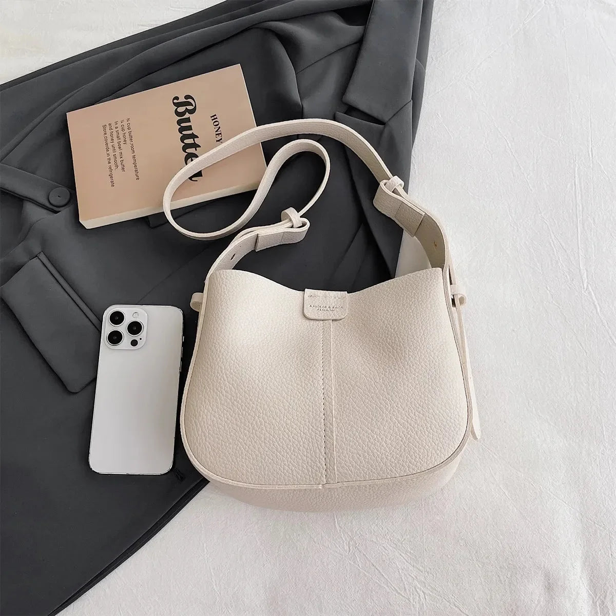 Womens minimalist shoulder bag large capacity PU leather magnetic cross body used for daily commutingshopping 250320