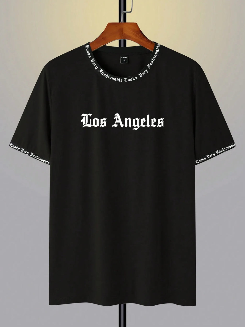 Black Oversized Graphic Print Crew Neck T-Shirt with Gothic Font Design