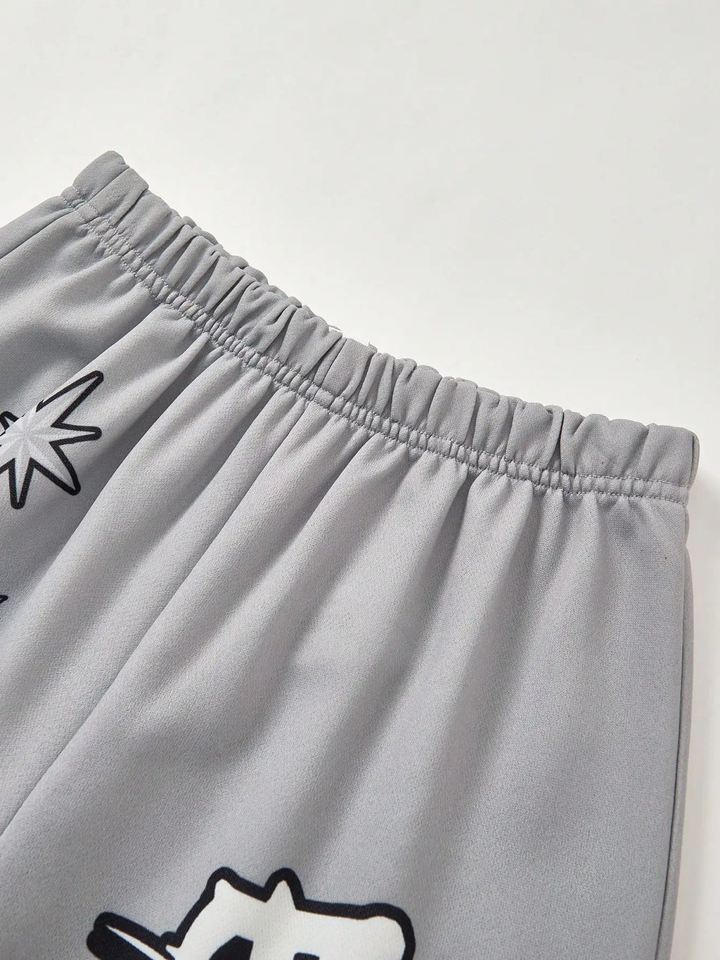 Gray Youth Streetwear Joggers with Gothic Cross & Flame Print