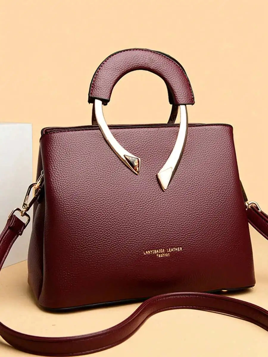 Burgundy Top-Handle Handbag with Metal Arch Handle and Textured Faux Leather