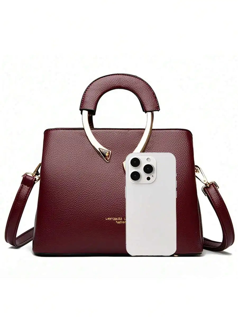 Burgundy Top-Handle Handbag with Metal Arch Handle and Textured Faux Leather