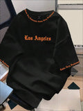 Black Oversized Graphic Print Crew Neck T-Shirt with Gothic Font Design
